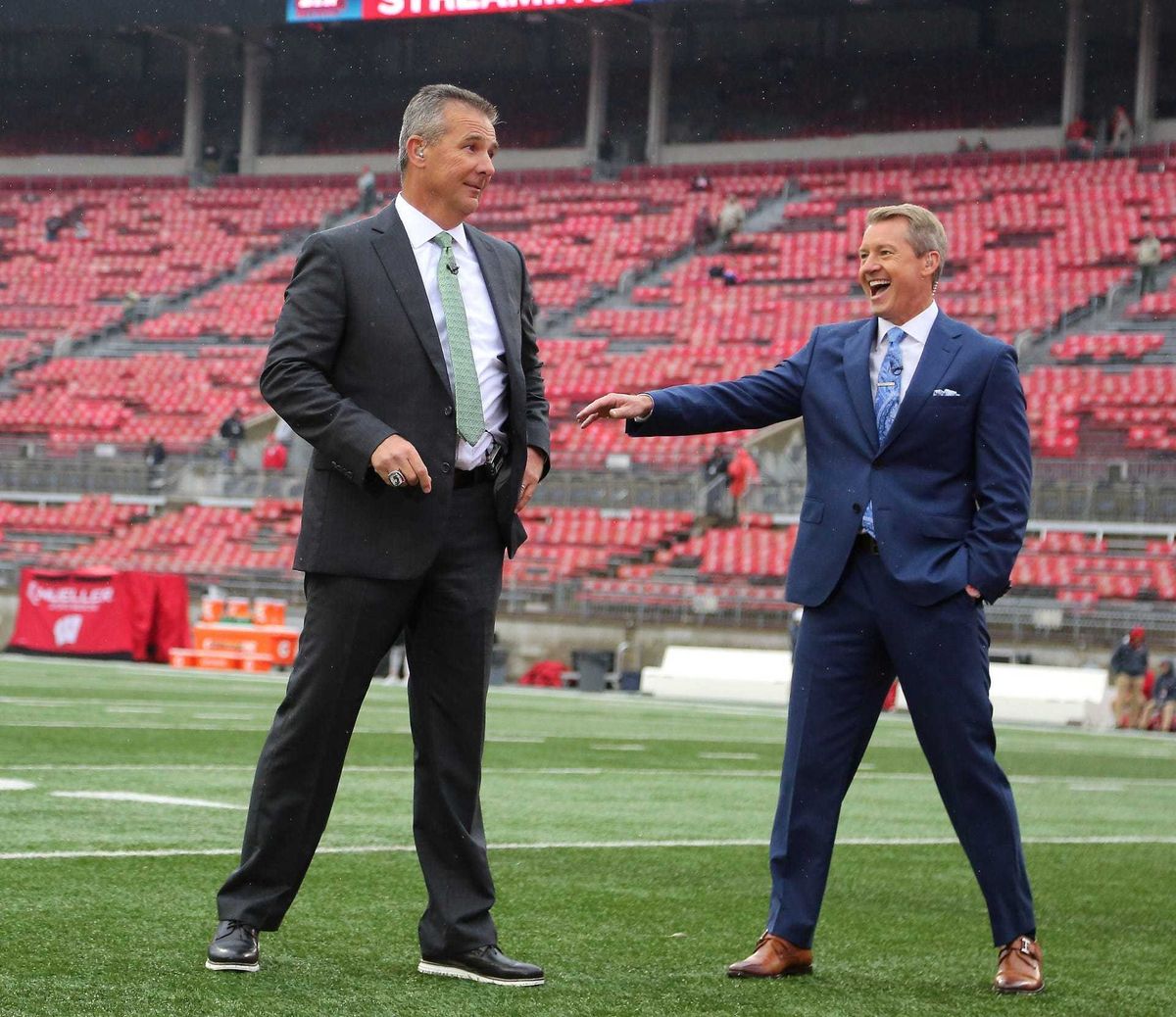FOX Sports host Rob Stone and Urban Meyer