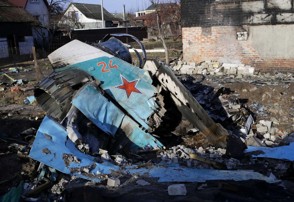 Fragments of a Russian jet fighter on a private house in Chernihiv, Ukraine, Wednesday, April 6, 2022