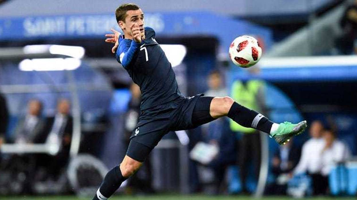 France forward Antoine Griezmann lunges for the ball during the second half in the semifinals of the FIFA World Cup 2018 against Belgium on July 10, 2018, at Saint Petersburg Stadium in Moscow.