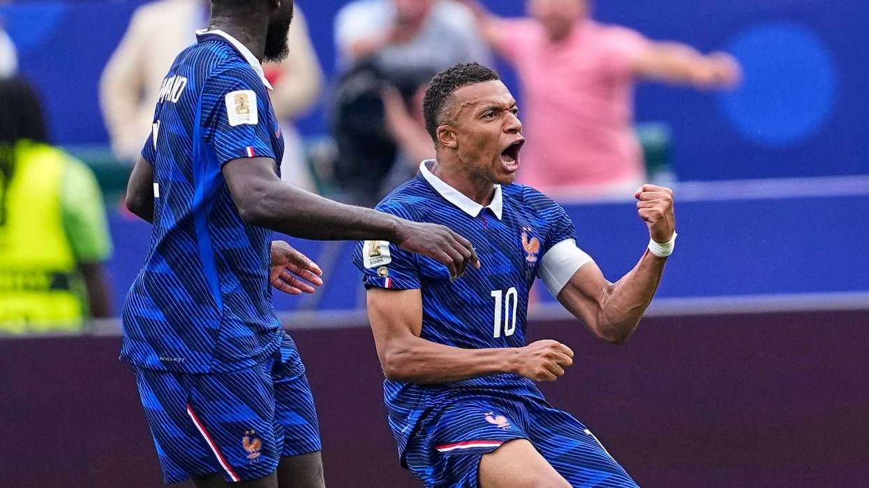 Kylian Mbappé scores 2 goals to lead France to 3-0 win over Iraq and into World Cup knockout stage