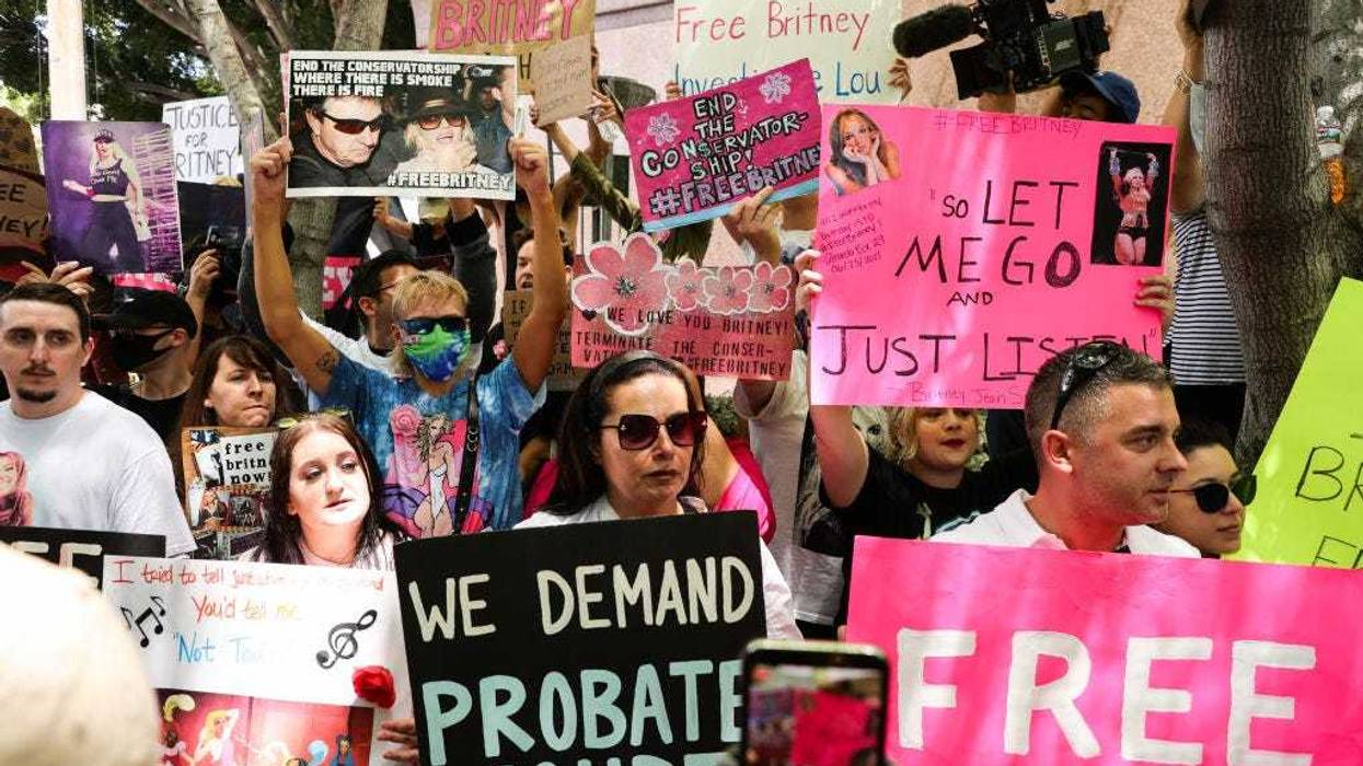 #FreeBritney activists protest at Los Angeles Grand Park during a conservatorship hearing for Britney Spears on June 23, 2021, in Los Angeles, California. Spears was placed in a conservatorship managed by her father, Jamie Spears, and an attorney, which controls her assets and business dealings, following her involuntary hospitalization for mental care in 2008.