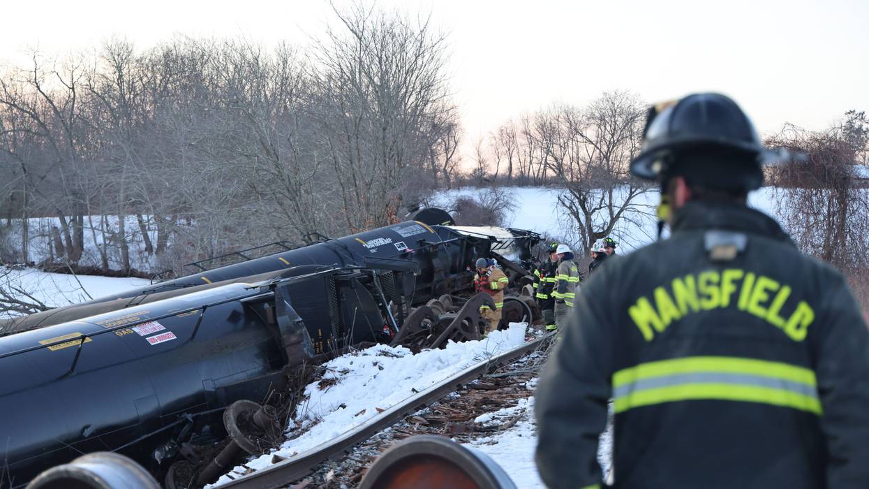 Freight train cars lie on their sides after a derailment in Mansfield, CT, 2/5/26