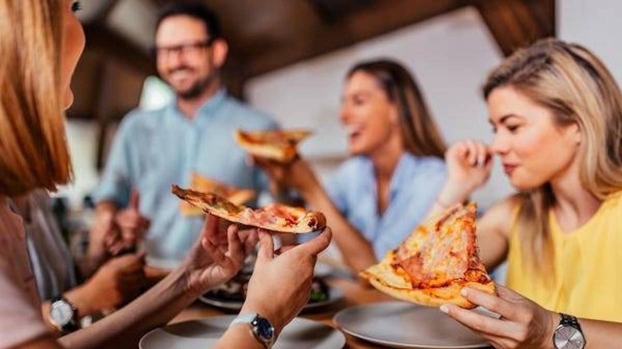 Friends enjoying pizza