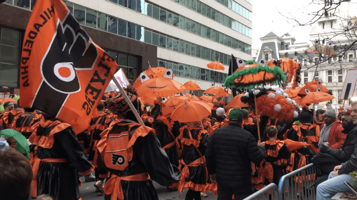 Froggy Carr club dressed with a Flyer's theme during the Mummer's Parade.