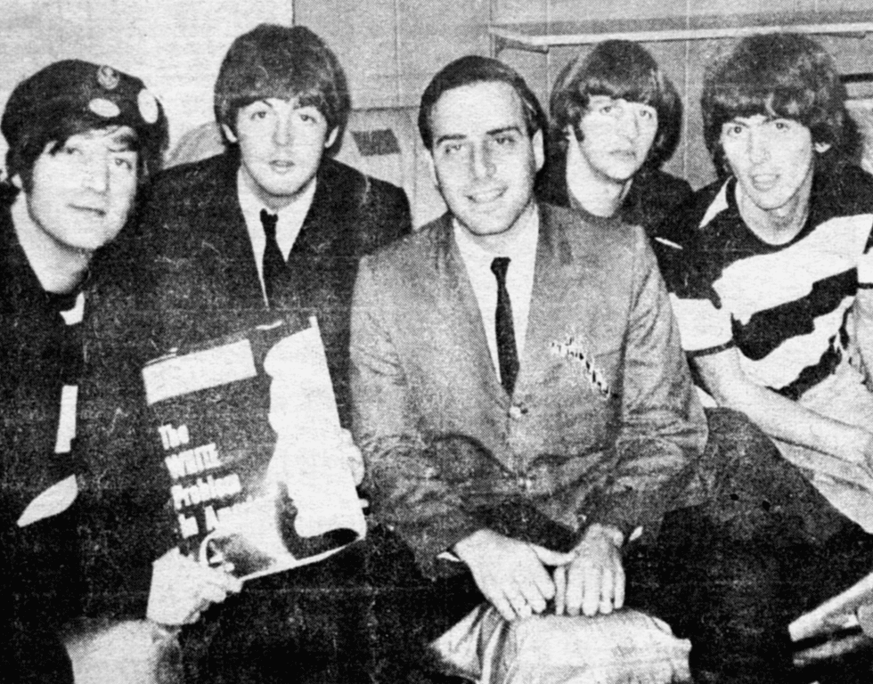 From left: John Lennon, Paul McCartney, Larry Kane, Ringo Starr and George Harrison