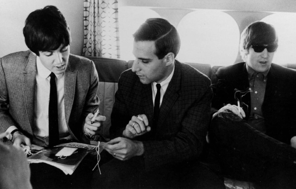 From left: Paul McCartney, Larry Kane, John Lennon