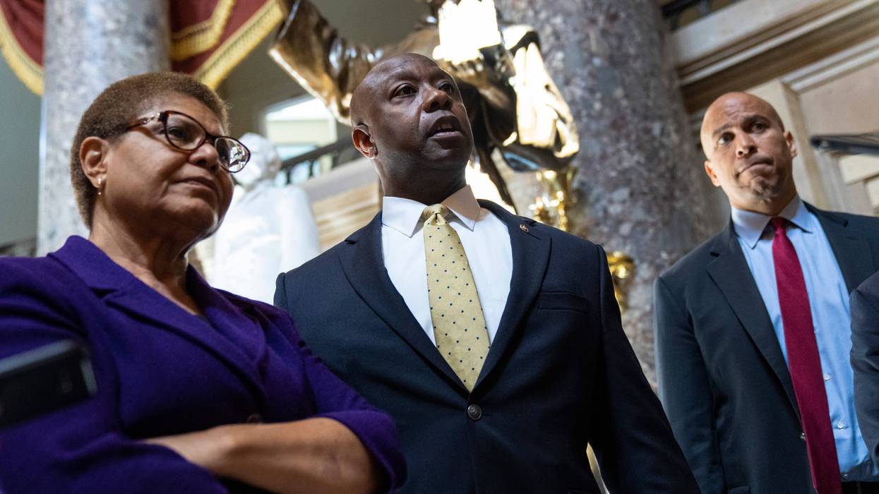 From left: Rep. Karen Bass (D-CA), Sen. Tim Scott (R-SC), and Sen. Cory Booker (D-NJ)