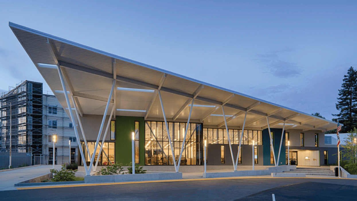 Front entrance to San Lorenzo branch of Alameda County Library pictured after sunset.