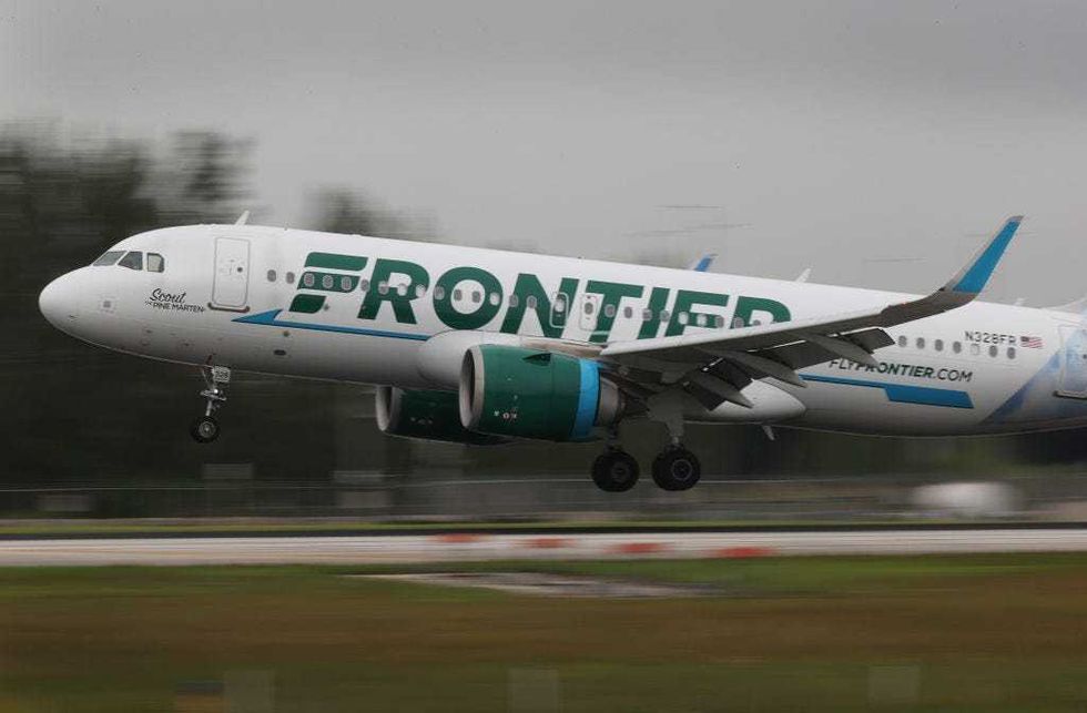 Frontier airlines plane lands at the Miami International Airport on June 16, 2021 in Miami, Florida.