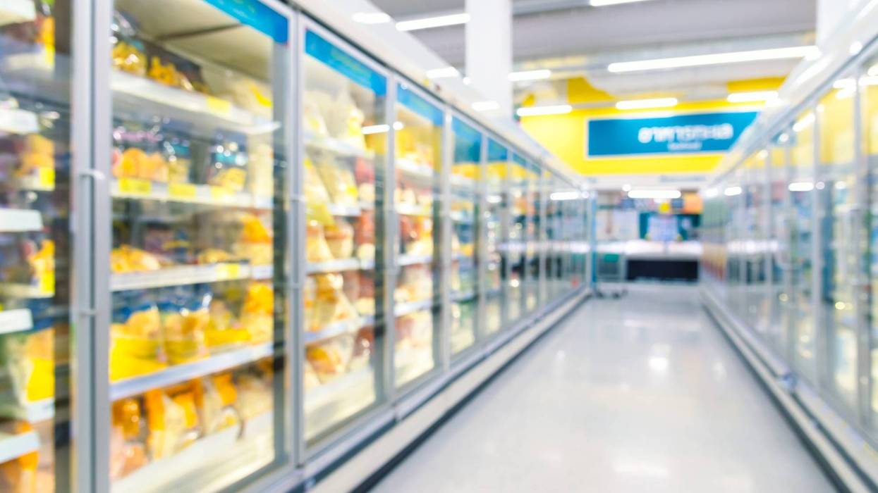 Frozen food freezers and shelves in the supermarket.