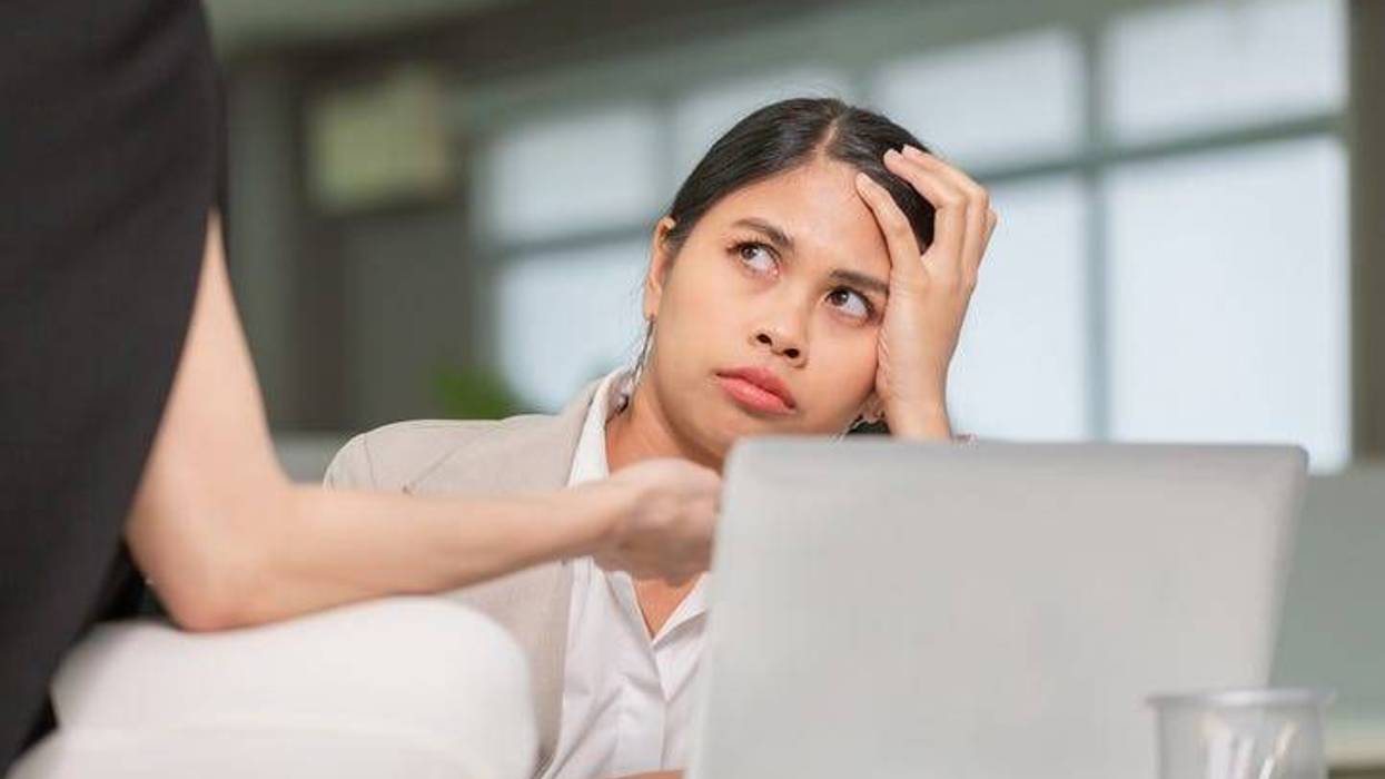 Frustrated woman at work