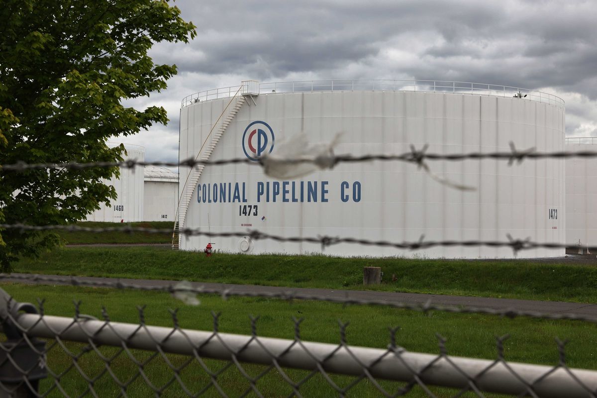Fuel holding tanks are seen at Colonial Pipeline's Linden Junction Tank Farm on May 10, 2021 in Woodbridge, New Jersey.