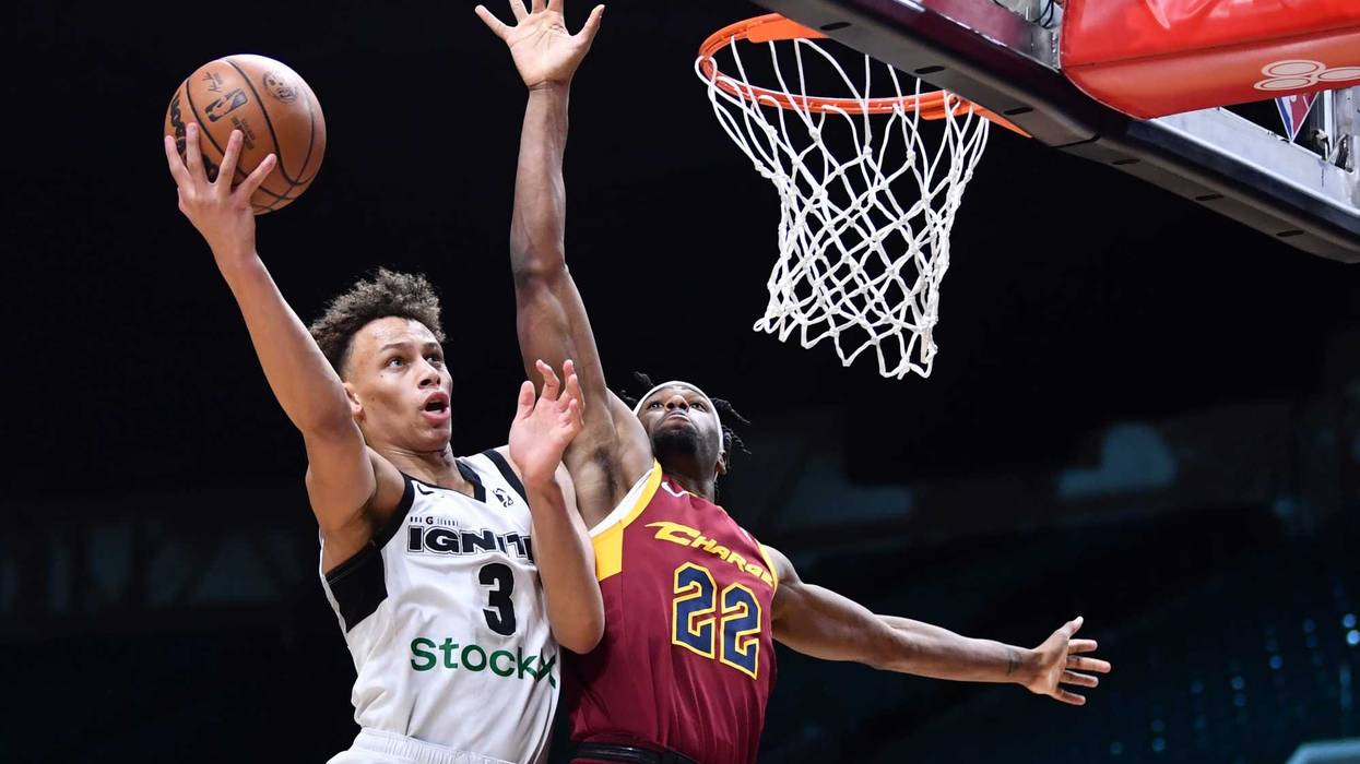 G League Ignite guard Dyson Daniels (3) drives to the basket against Cleveland Charge guard R.J. Nembhard (22) during the second half of the NBA G League Next Gem Game at the Wolstein Center.