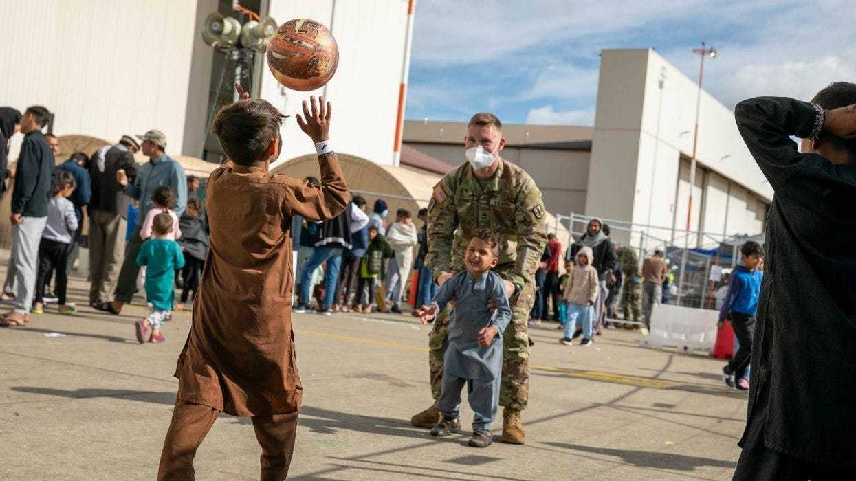 GALLERY: Army soldiers bring smiles to Afghan children