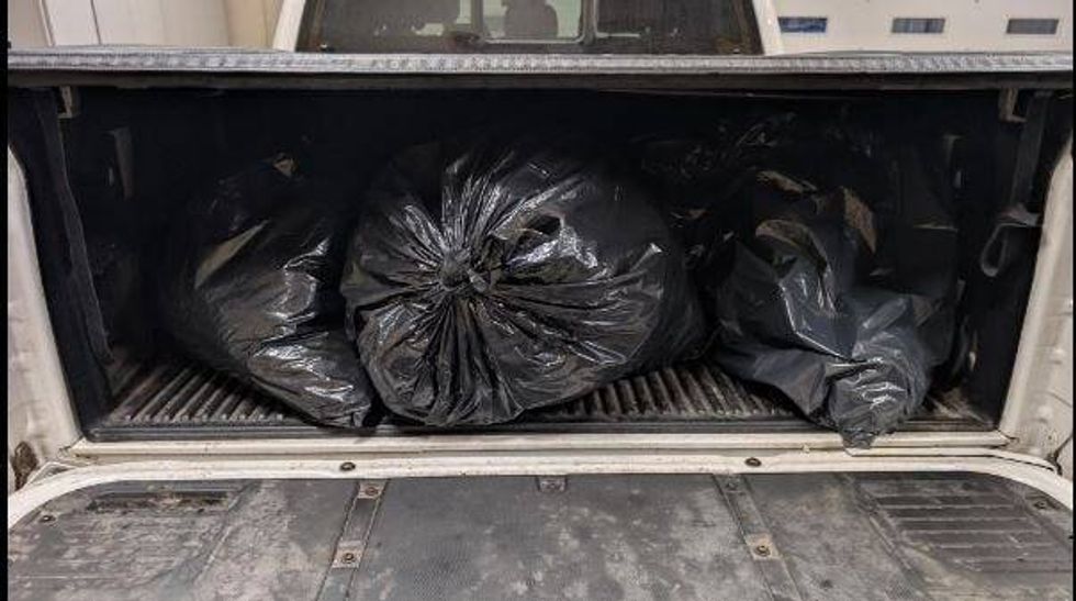 Garbage bags in back of the vehicle
