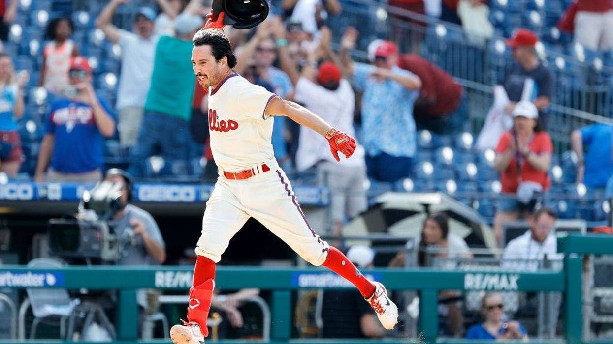 Garrett Stubbs, #21 of the Philadelphia Phillies, rounds bases after hitting a walk-off three-run home run to defeat the Miami Marlins at Citizens Bank Park on June 15, 2022, in Philadelphia, Pennsylvania.