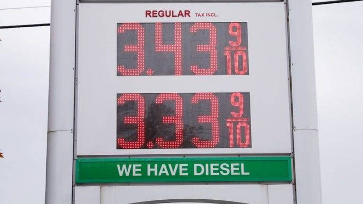 Gas prices displayed on a sign