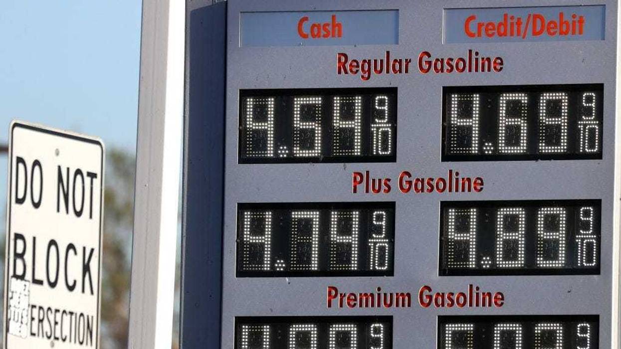 Gasoline prices are displayed outside a gas station on November 23, 2021 in Los Angeles, California. President Biden announced a plan to release oil from the Strategic Petroleum Reserve in an effort to curb high gas prices.