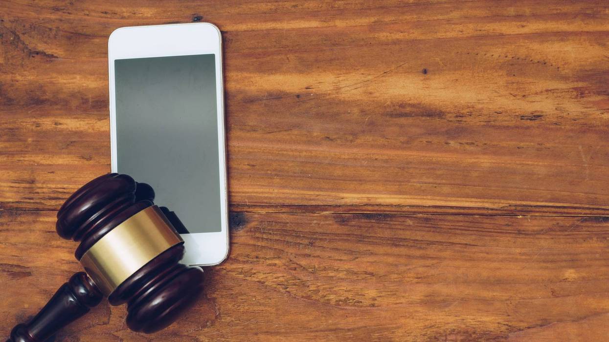 Gavel and cell phone