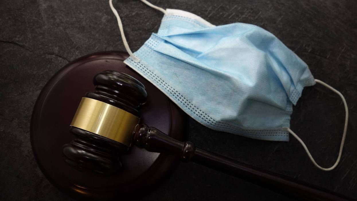 gavel and covid mask