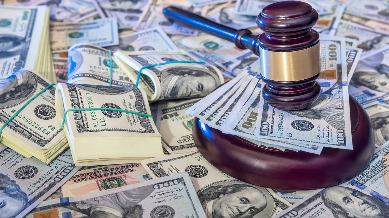 Gavel and hundred dollar bills