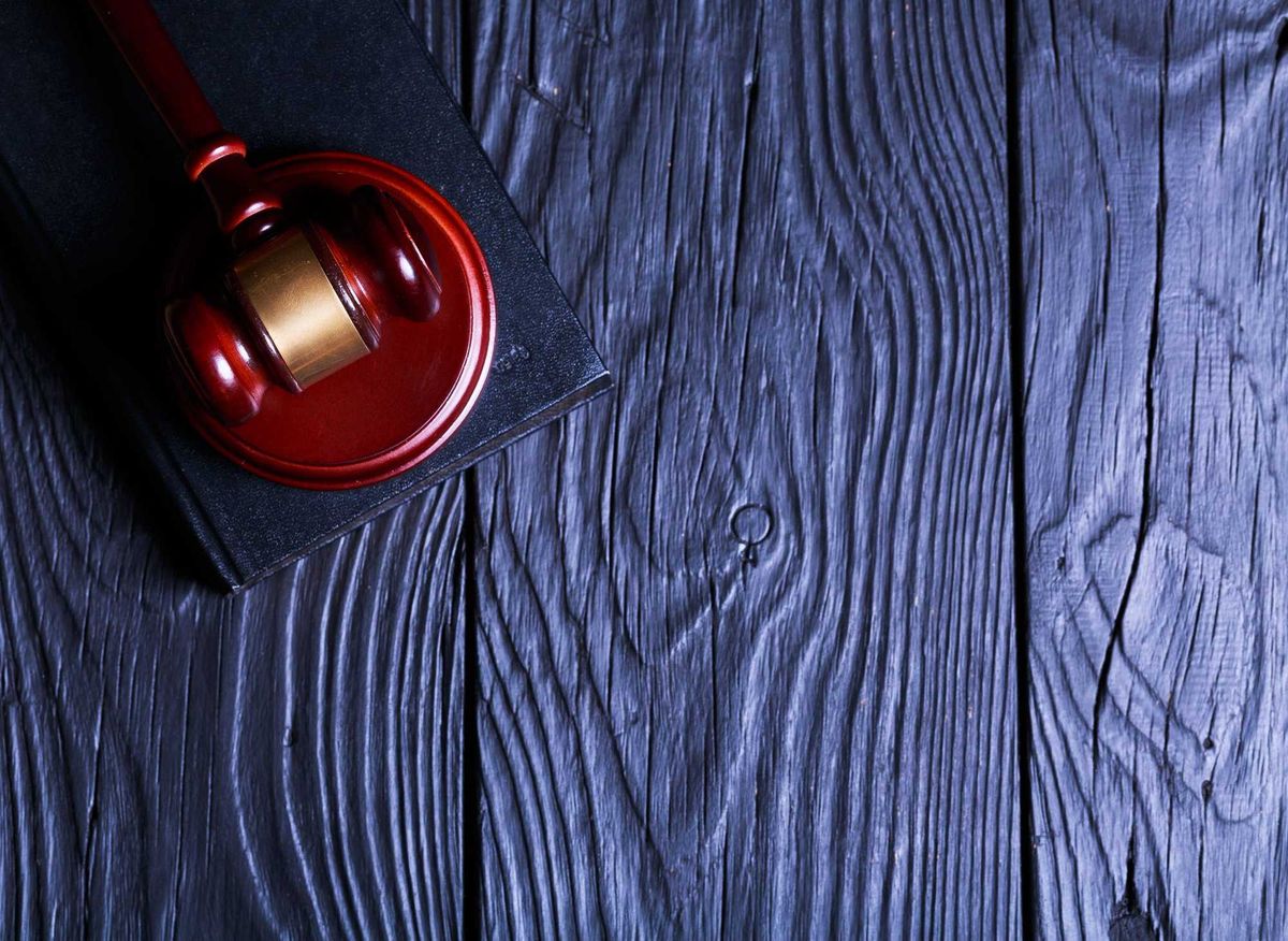 Gavel on dark background.