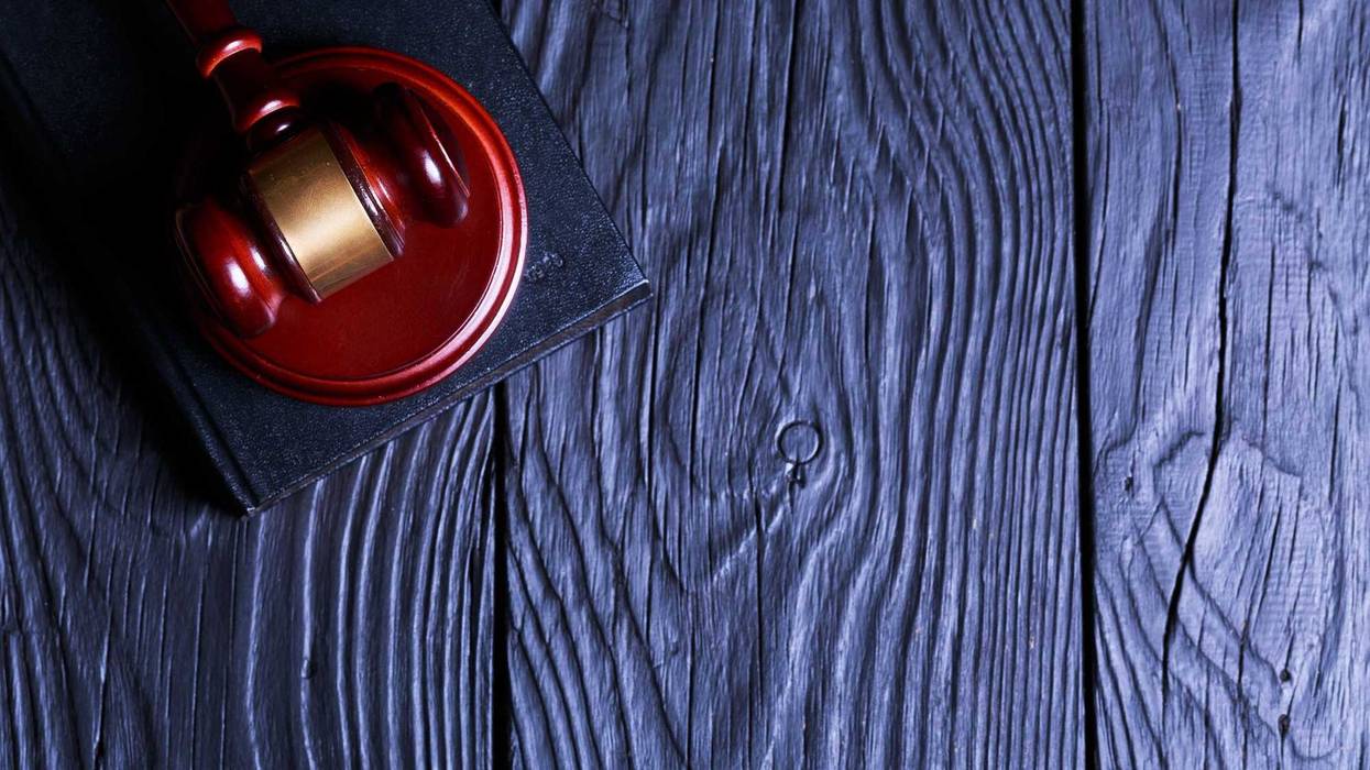 Gavel on dark background.