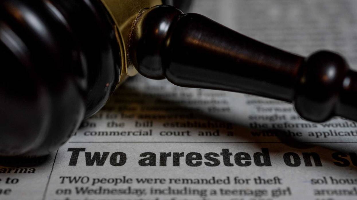 Gavel on Newspaper headline. Criminal law concept