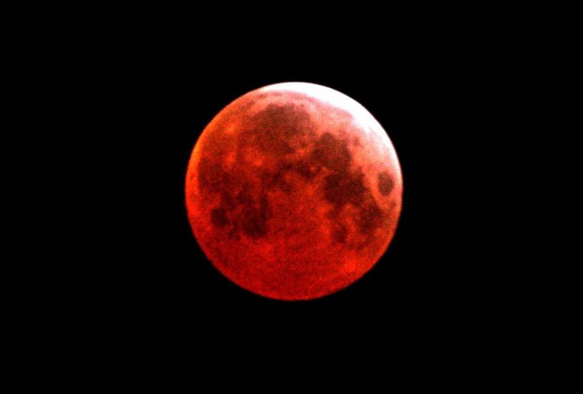 GAZA CITY, GAZA STRIP - MARCH 03: The earth's shadow passes over the moon for the first total lunar eclipse in three years March 3, 2007 over Gaza City, Gaza Strip. The next full lunar eclipse will occur on August 28, 2007. (Photo by Abid Katib/Getty Images)