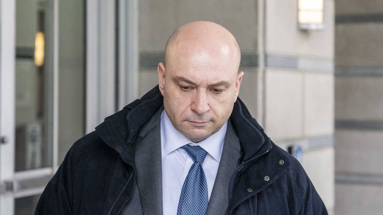 Gene Daniel Levoff, a former lawyer in charge of Apple Inc.'s insider trading policy, exits from federal court in Newark, New Jersey, U.S., on Wednesday, Feb. 20, 2019. Levoff appeared in federal court a week after prosecutors said he had traded on confidential revenue and earnings filings since 2011. Levoff was released on a $500,000 bond after entering a not-guilty plea to insider-trading charges.