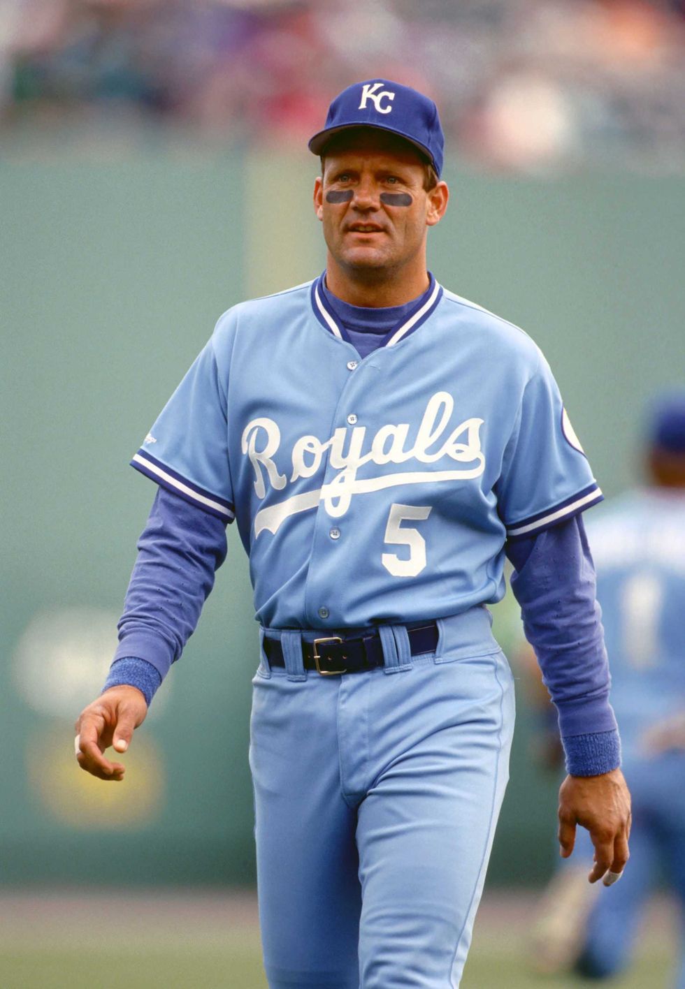 George Brett models the all powder blue uniforms that will return for the Royals in 2022.