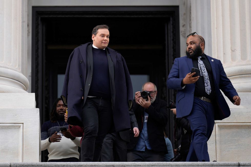 George Santos leaves the U.S. Capitol after his fellow members of Congress voted to expel him from the House of Representatives on Dec. 1, 2023