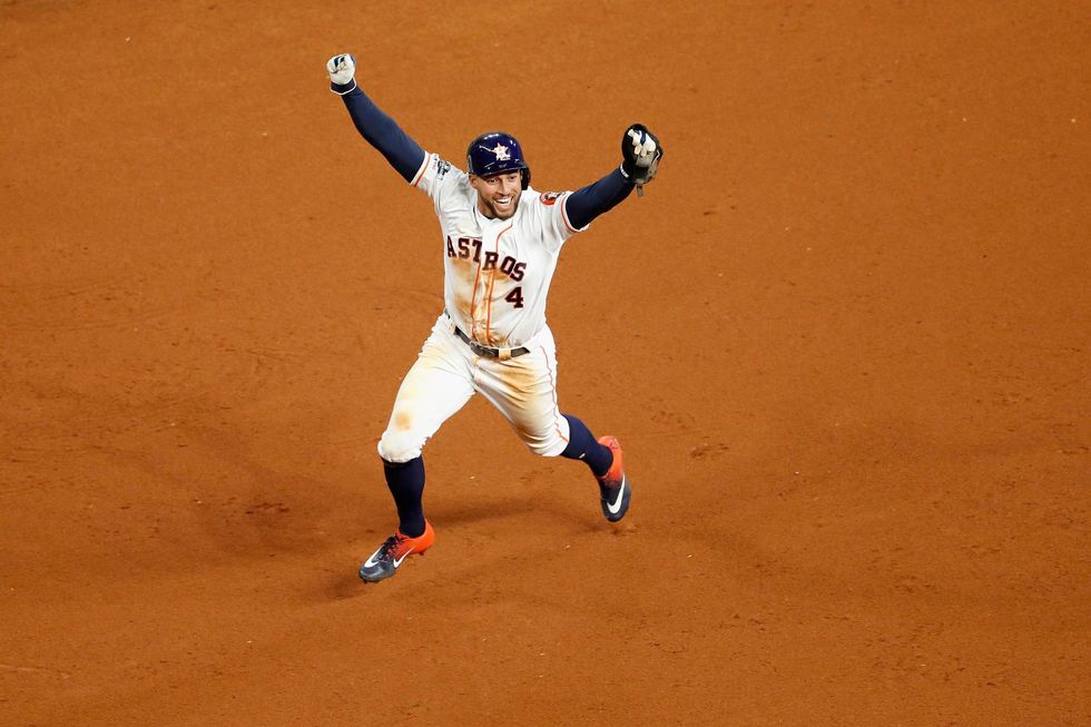 George Springer celebrates Jose Altuve