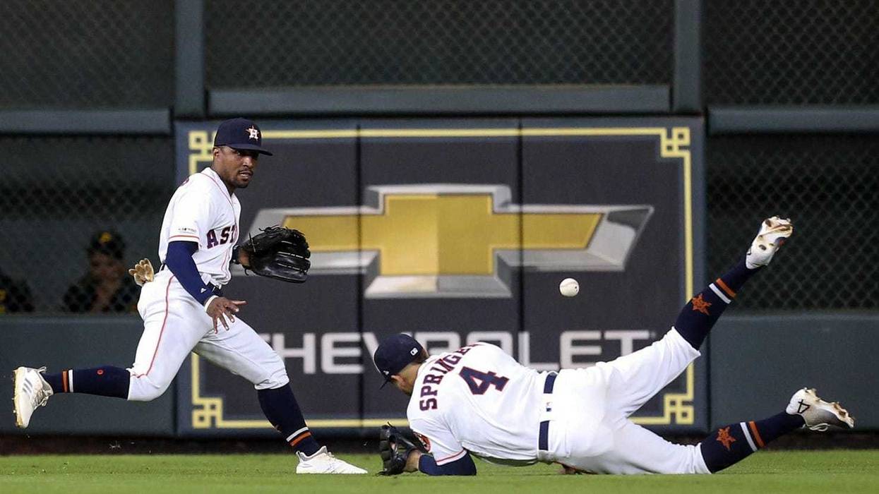 George Springer dives and misses