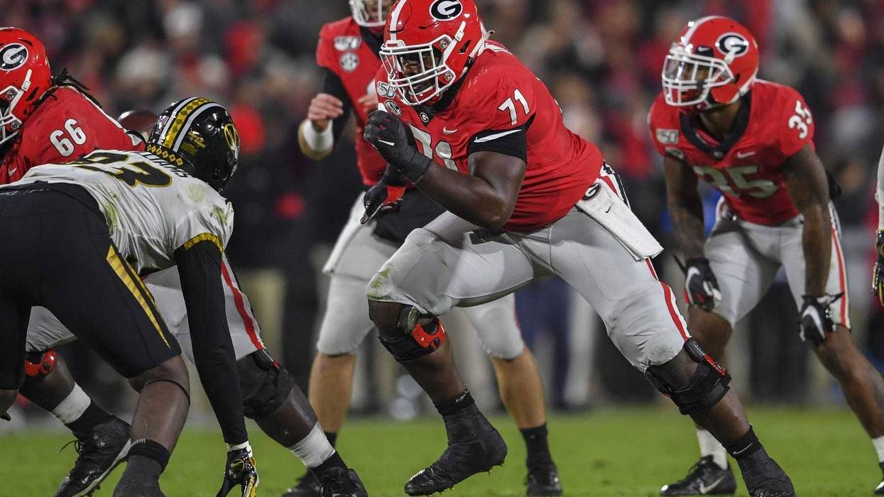 Georgia Bulldogs offensive lineman Andrew Thomas (71) blocks against the Missouri Tigers during the first half at Sanford Stadium.