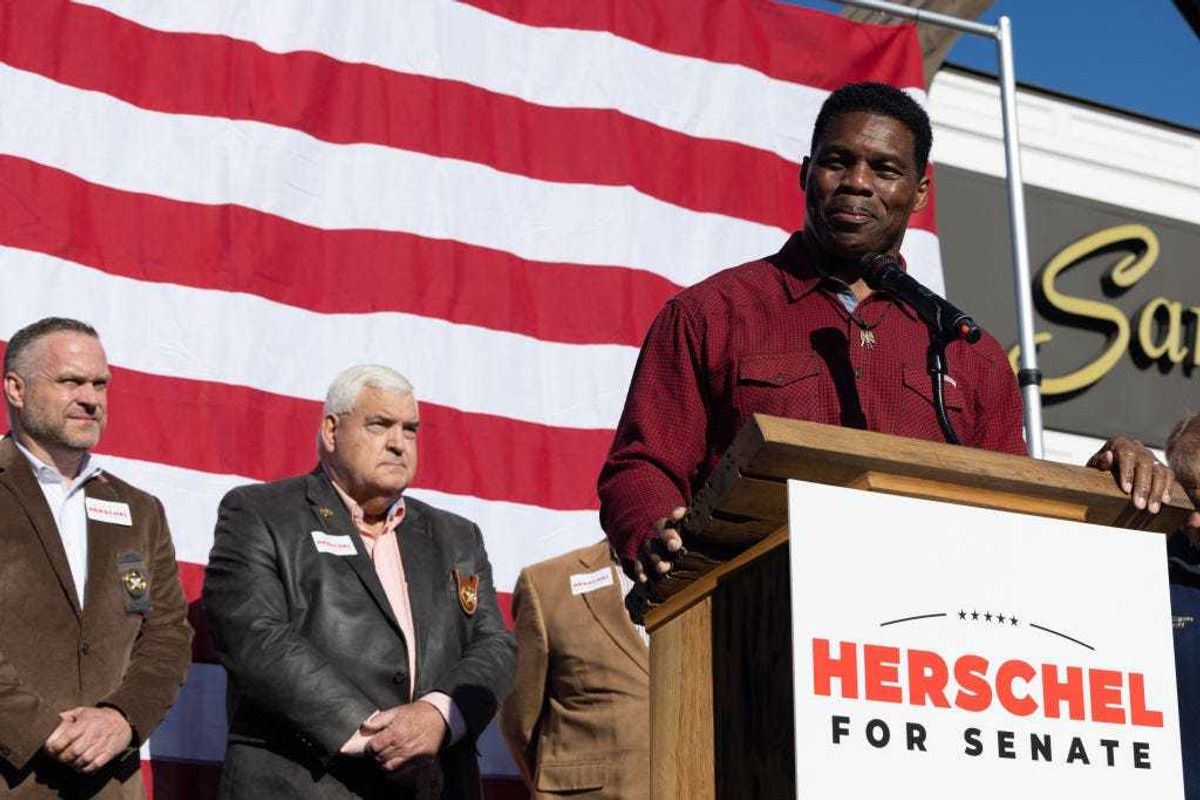 Georgia Republican Senate nominee Herschel Walker addresses the crowd of supporters during a campaign stop on October 20, 2022 in Macon, Georgia. Walker in running against incumbent Senator Raphael Warnock (D-GA) in the mid-term elections. (Photo by Jessica McGowan/Getty Images)