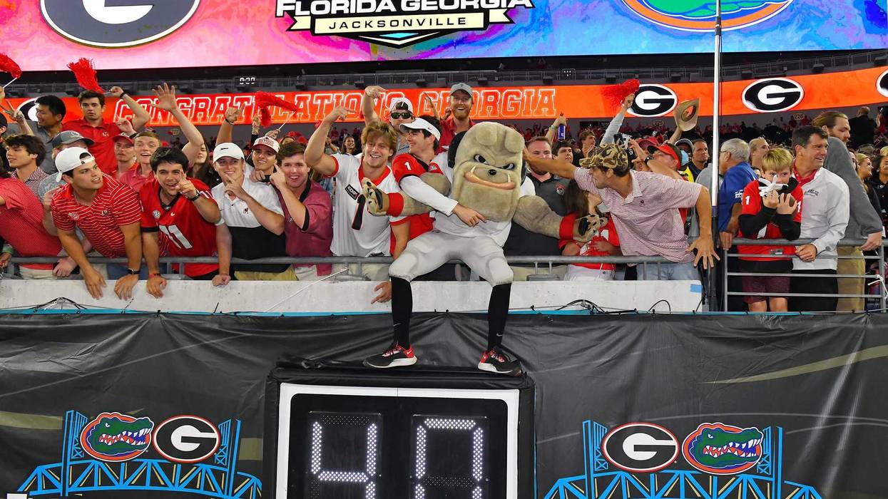 Georgia's mascot Hairy Dawg celebrates in the stands with fans after the Bulldog's victory over Florida. The Florida Gators fell to the Georgia Bulldogs 34 to 7. The Florida Gators were the home team for this years annual Florida vs Georgia college football rivalry game at TIAA Bank field in Jacksonville, Florida Saturday, October 30, 2021.