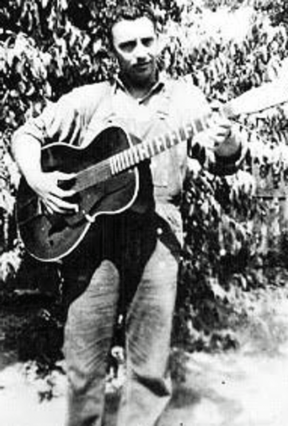 Gerald Helms playing guitar