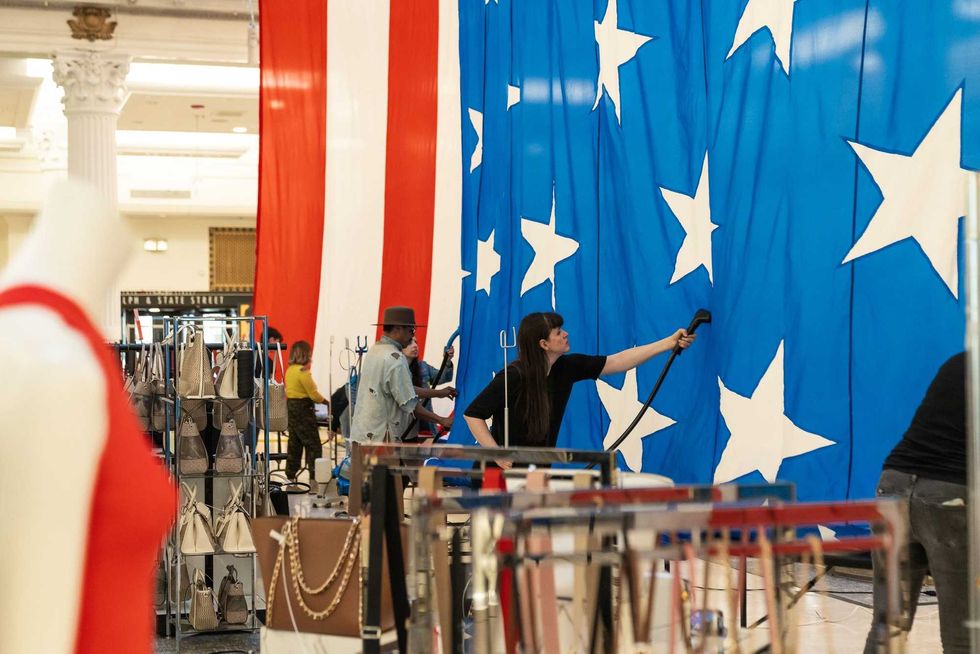Giant American flag being unfurled in Macy