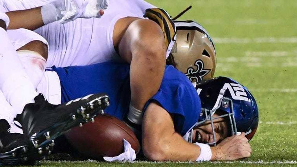 Giants quarterback Eli Manning fumbles the ball against the Saints late in the fourth quarter on Sept. 30, 2018, at MetLife Stadium.