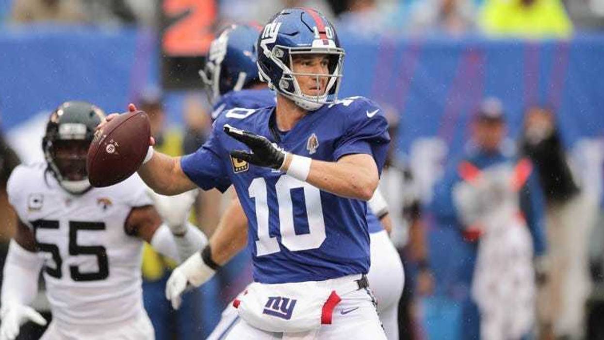 Giants quarterback Eli Manning passes the ball in front of Jacksonville Jaguars defensive end Lerentee McCray on Sept. 9, 2018, at MetLife Stadium.