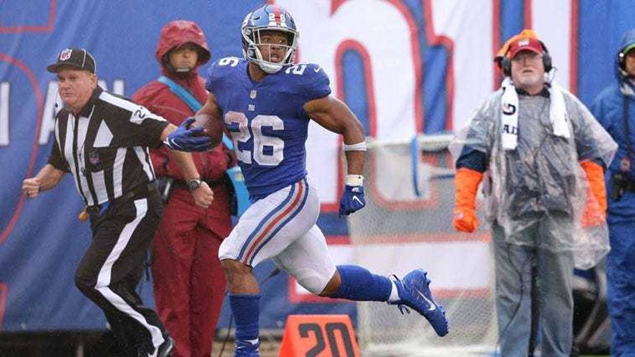 Giants running back Saquon Barkley runs for a touchdown against the Jacksonville Jaguars on Sept. 9, 2018, at MetLife Stadium.