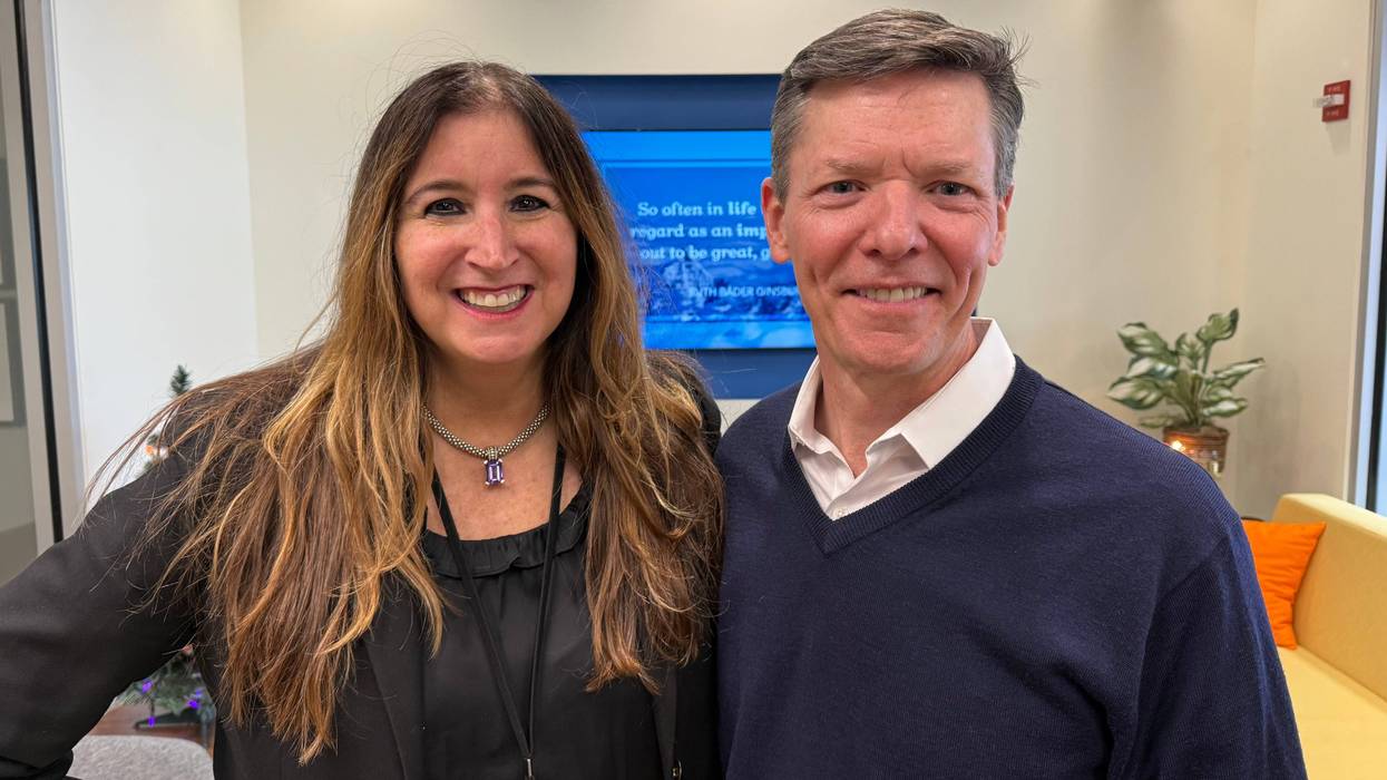 Gina Crash with Catholic Charities Executive Director Dave Kinkopf