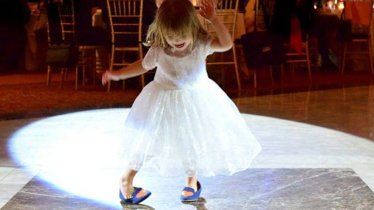 Girl dancing at wedding