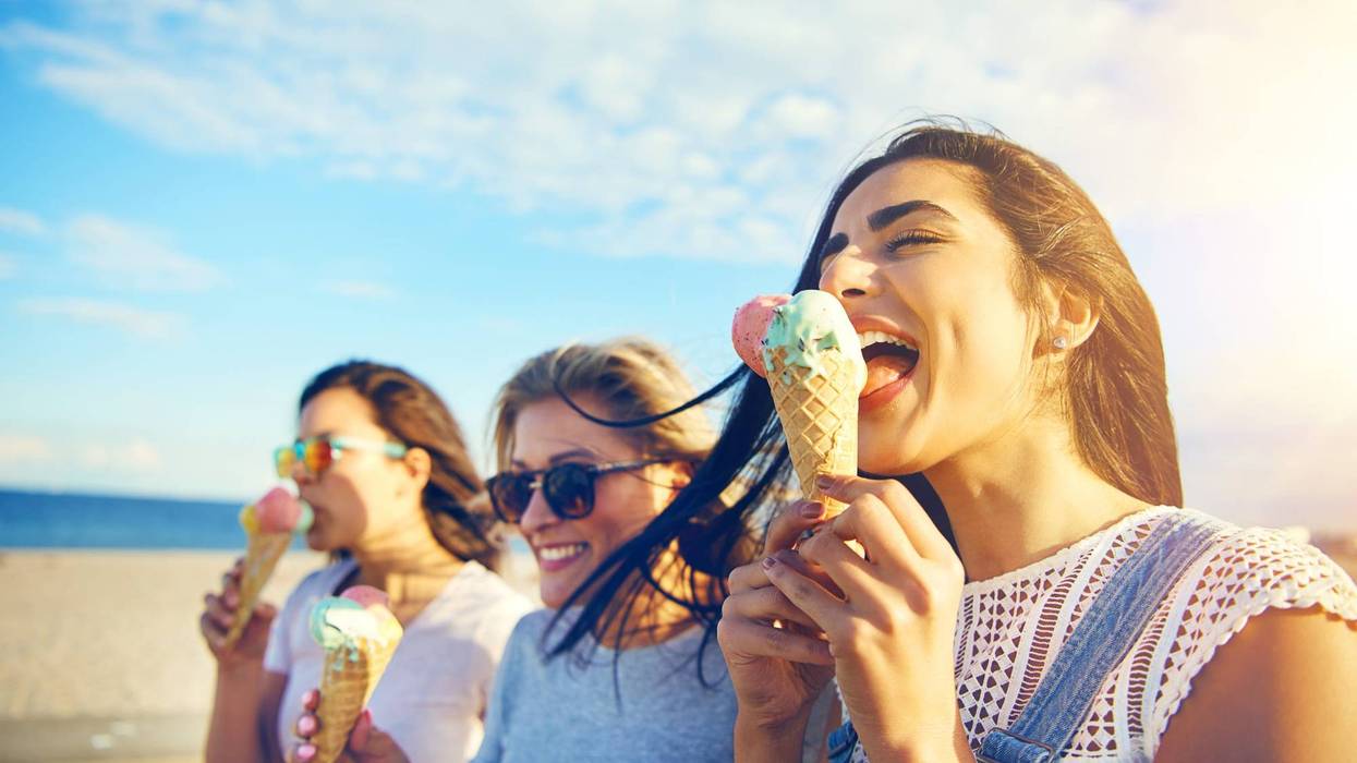 girl friends eating ice cream for dessert