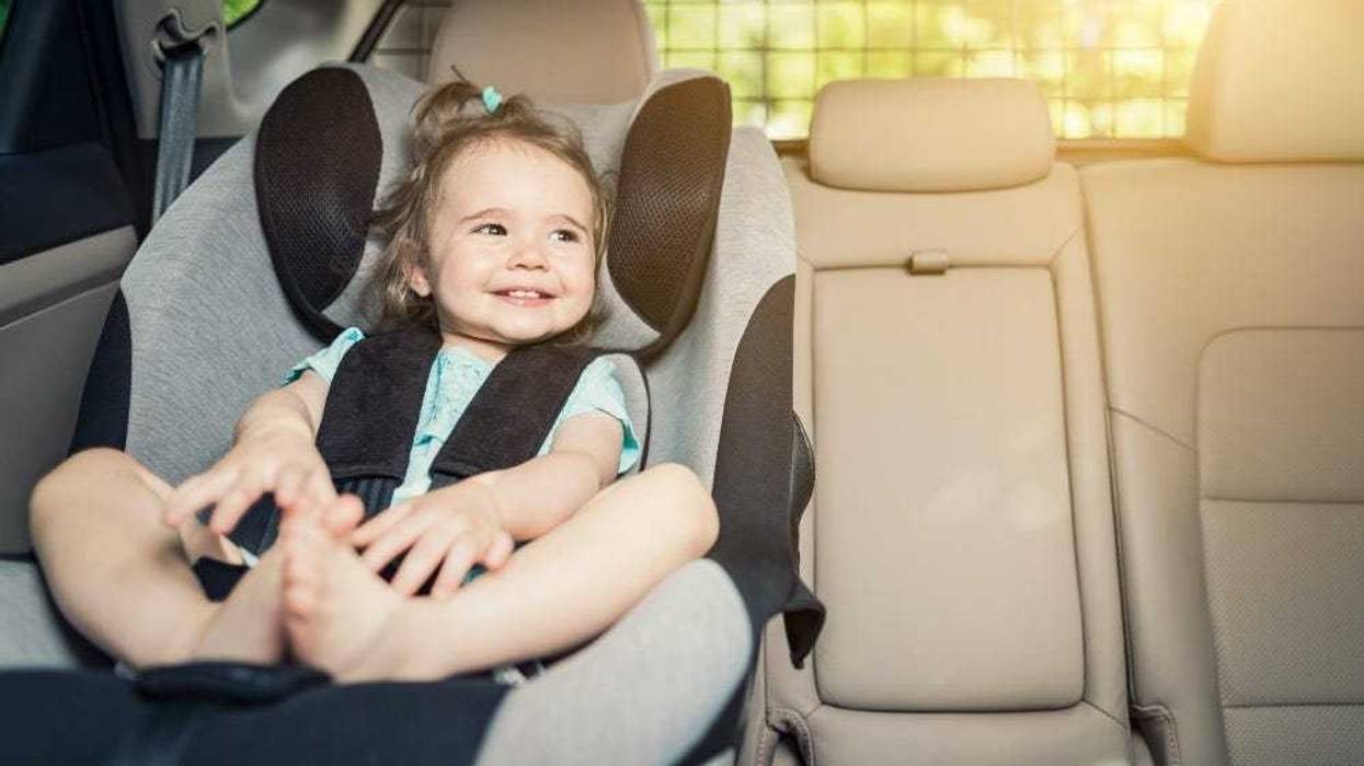 girl in car seat