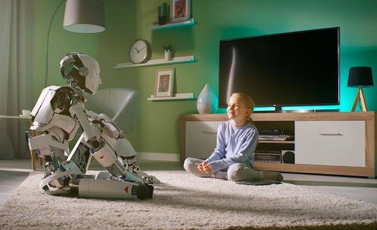 Girl speaking with robot friend at home