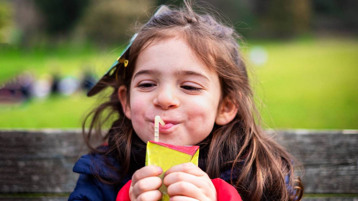 Girl with juice box