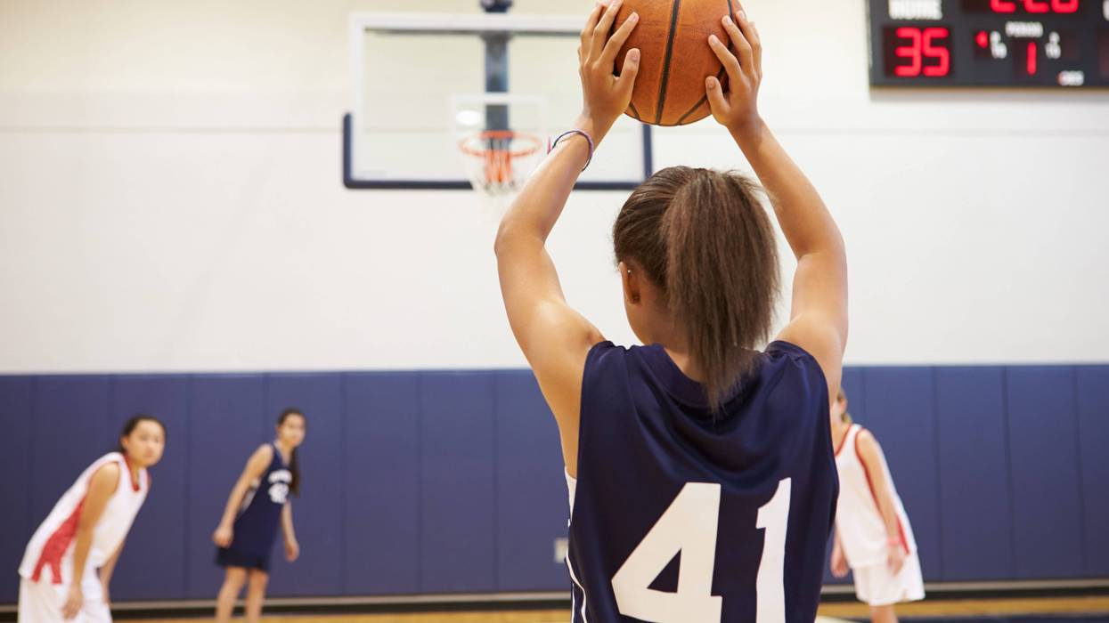 Girls playing basketball