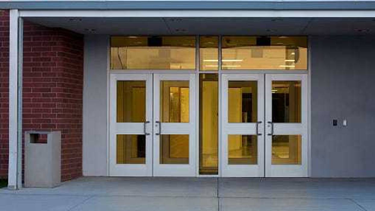 Glass and metal doors at a school's front entrance